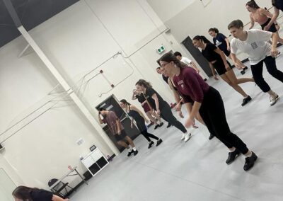 group of persons practicing for dance in the Trilogy Academy